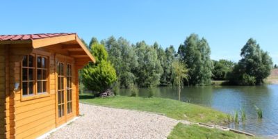 carp fishing France with wooden lodge
